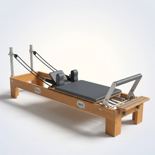 Pilates Reformer Built for Home Studios, Compact Design, Adjustable Resistance, Group Ready — Studio Shot